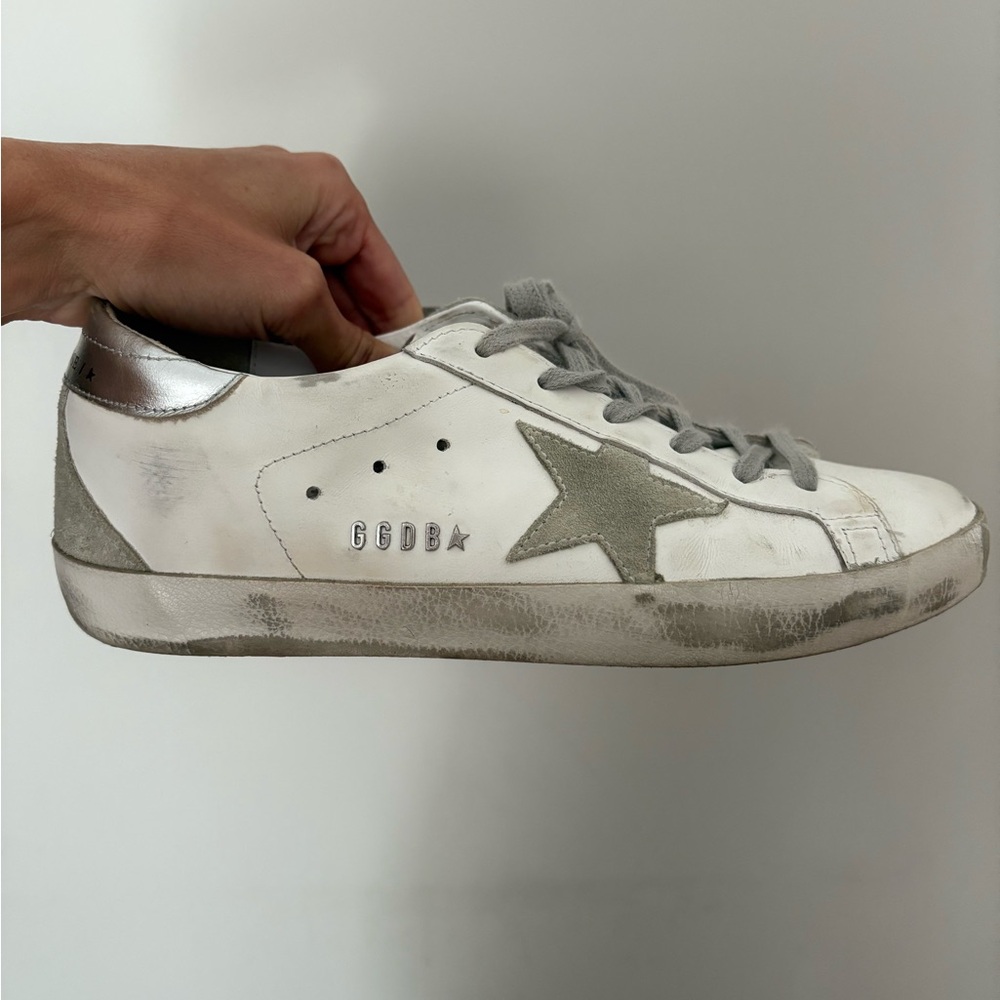 Golden Goose Distressed White and Silver Sneakers